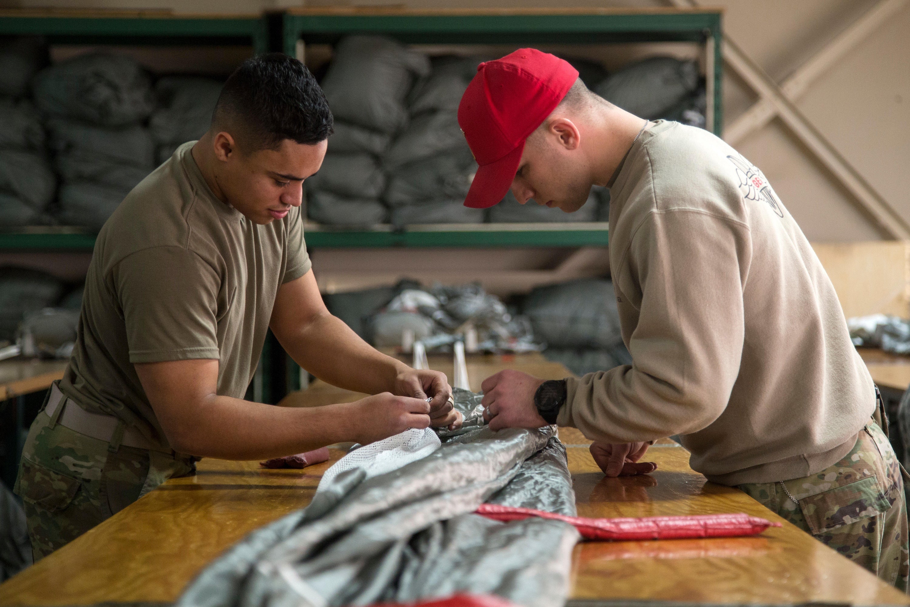 How Military Parachute Riggers Innovated and Upcycled Old Equipment to ...